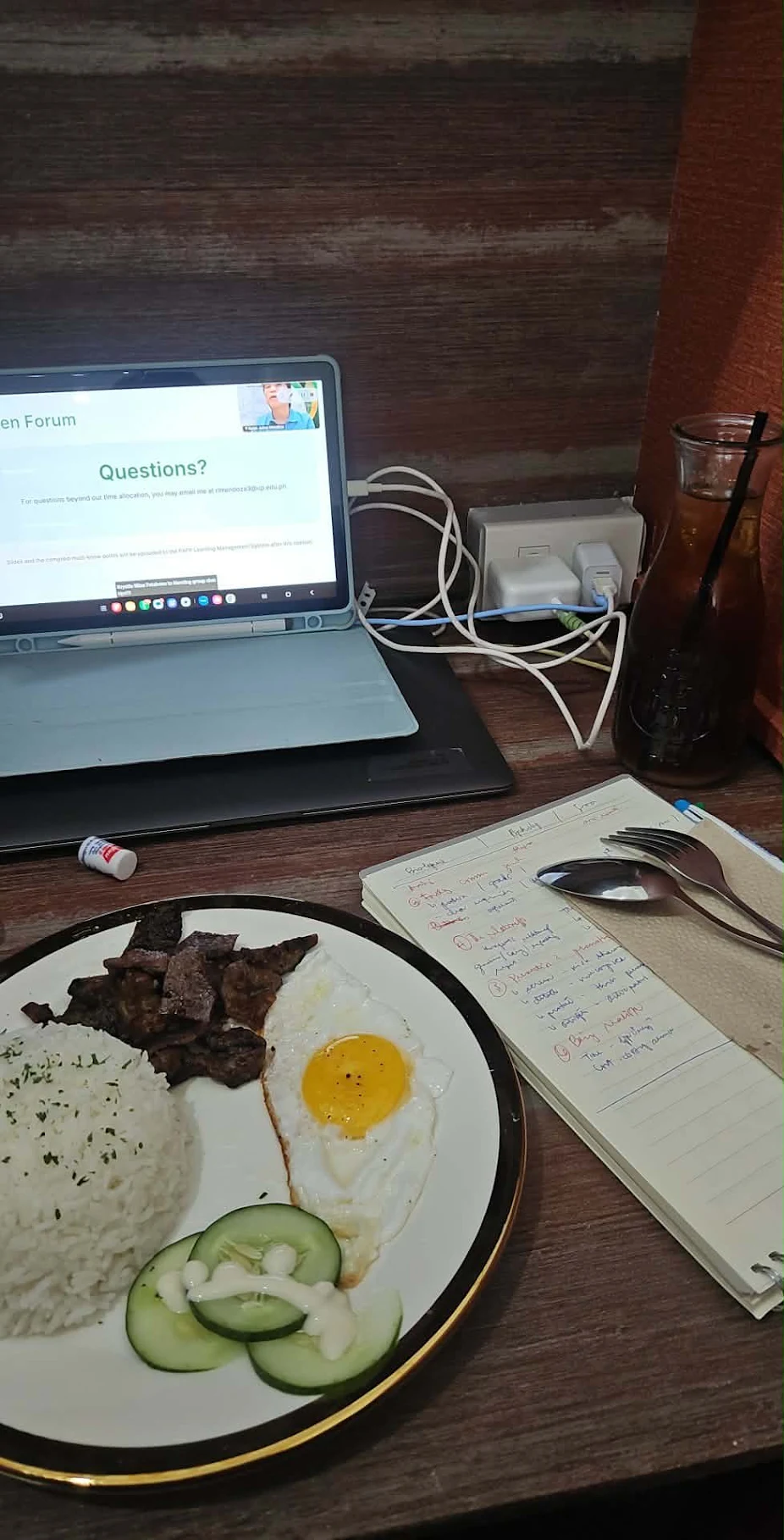 FocusLab coworking space workspace table with laptop, notebook, and breakfast plate, photo from a Google review by May Mary I.