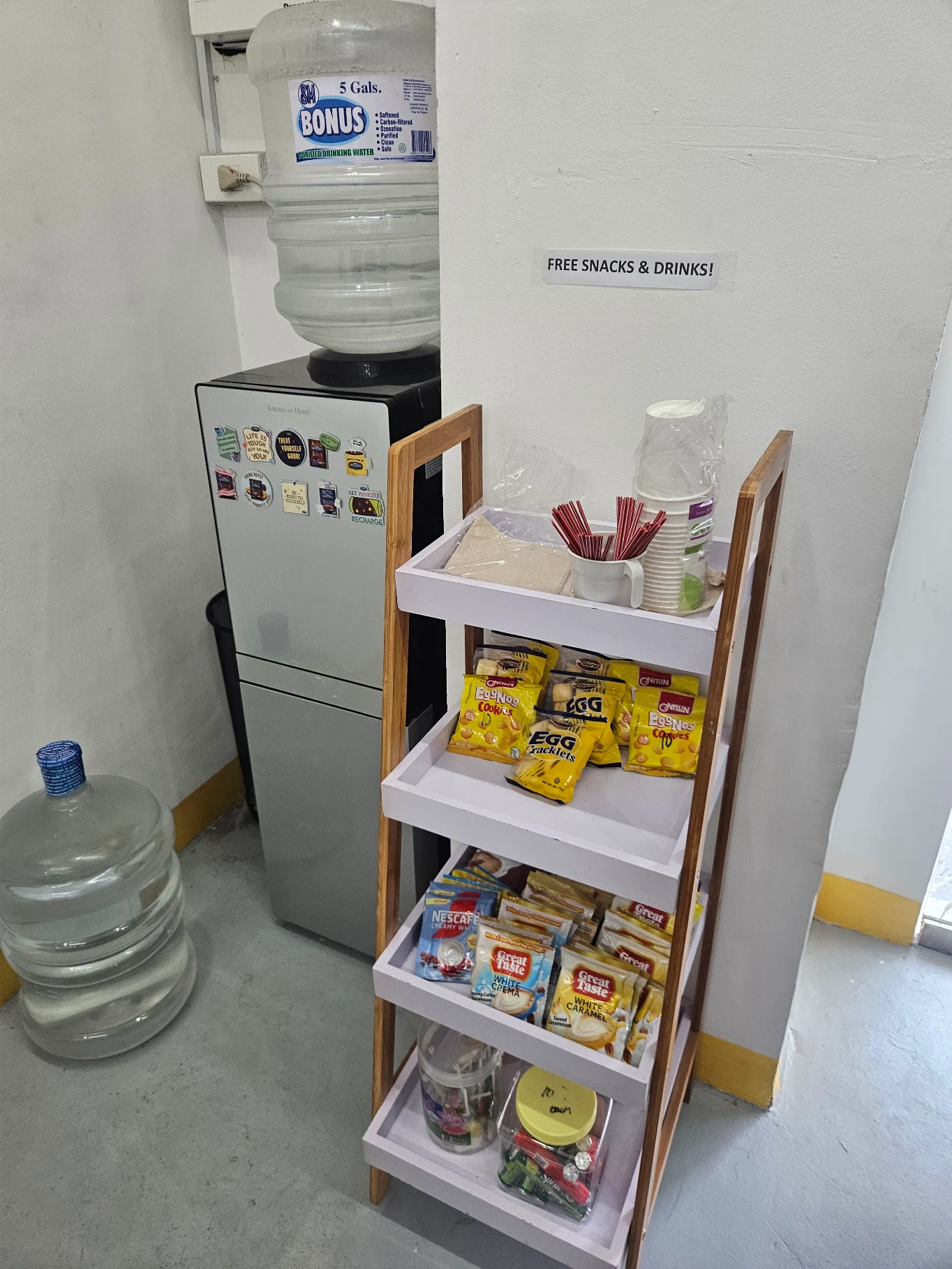 FocusLab coworking space free snacks and drinks pantry station, photo from a Google review by May Mary I.